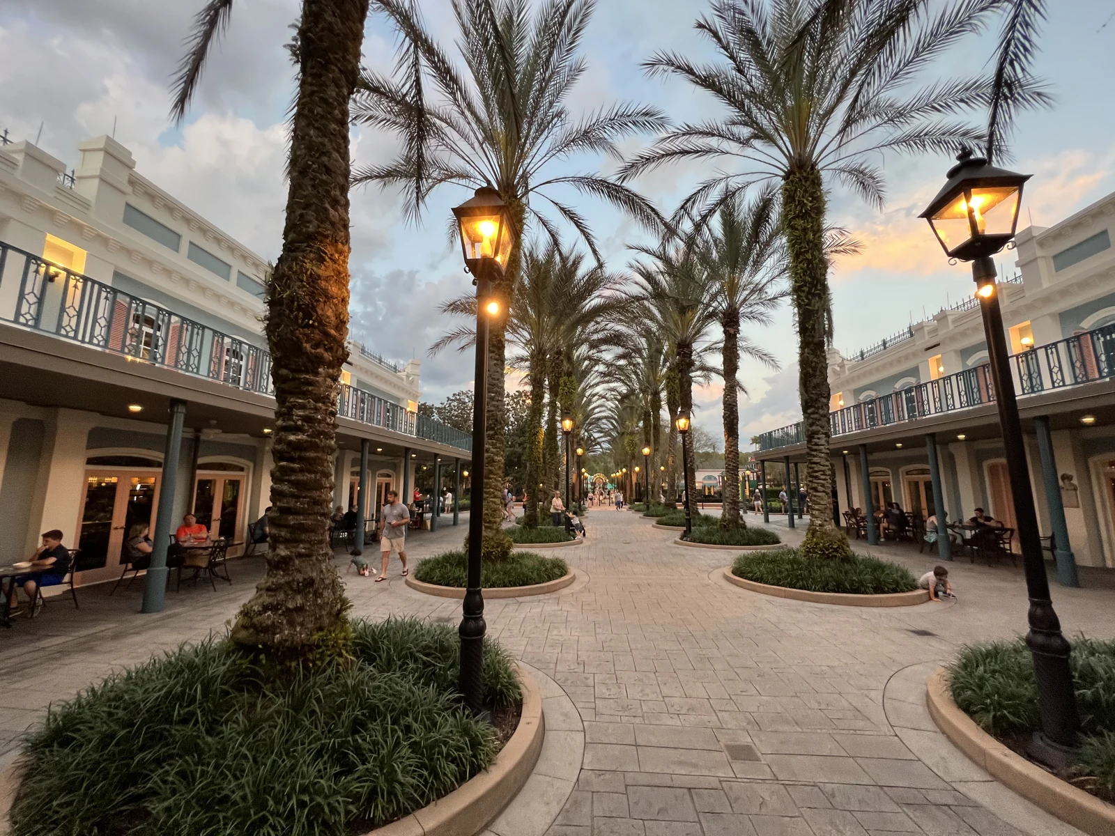 A palm-lined walkway at Port Orleans French Quarter, March 2022